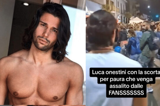 Luca Onestini accerchiato dalla sicurezza per arginare i fan: in realtà nessuno lo riconosce